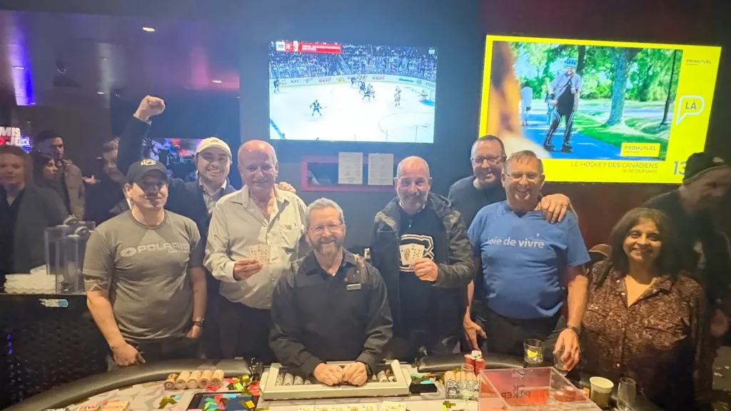 Ein leuchtender Jackpot-Gewinn-Bildschirm mit blinkenden Lichtern und bunten Zahlen im Casino du Lac-Leamy.